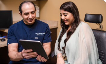 Doctor Showing Patient Screen